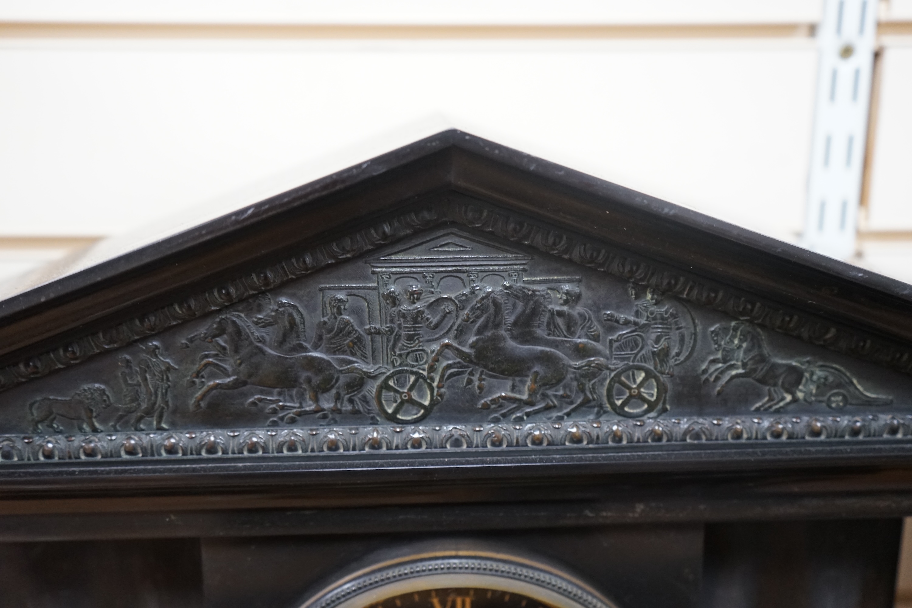 A Victorian black slate mantel clock, 54.5cm wide. Condition - columns and some clock parts loose